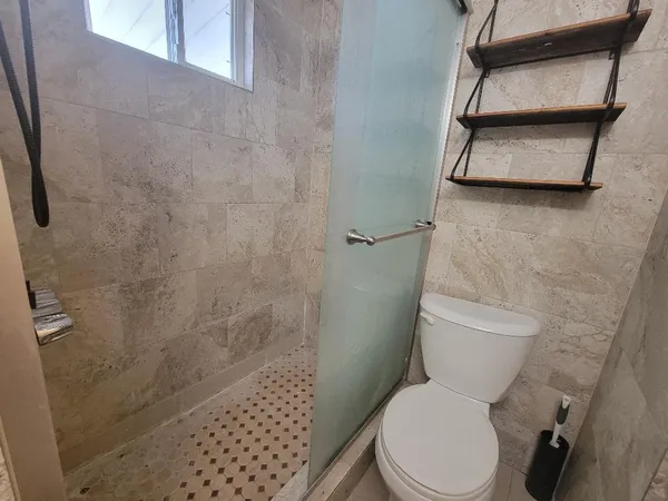 a bathroom with a sink a mirror and vanity