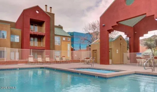 a view of a house with swimming pool
