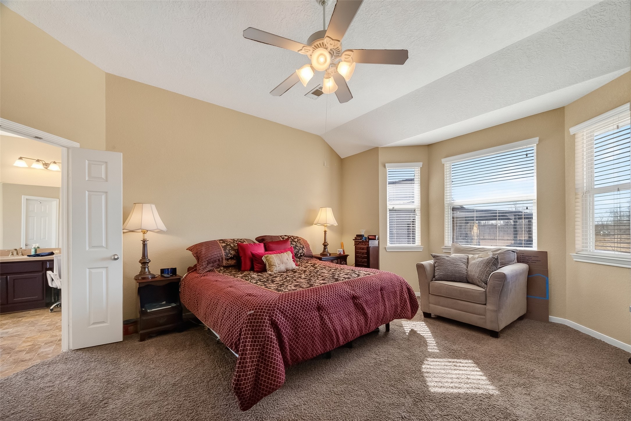 3418 Barbers Hill Road Highlands, TX 77562 - Photo 29 of 50 a bedroom with a bed and a couch next to a window