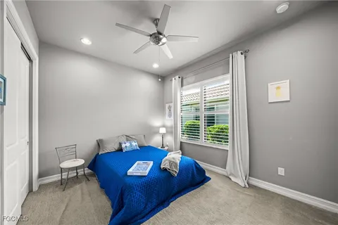 a living room with furniture a table and a window