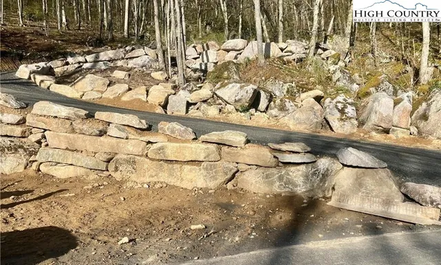 a view of covered with wooden fence