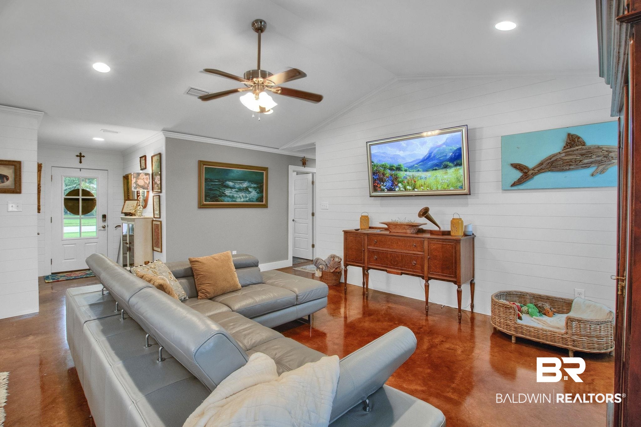 203 Lakefront Circle Summerdale, AL 36580 - Photo 18 of 69 Living room with lofted ceiling, ornamental molding, and ceiling fan
