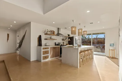 a kitchen with a cabinets and a stove