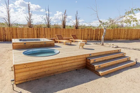 a view of swimming pool with a yard