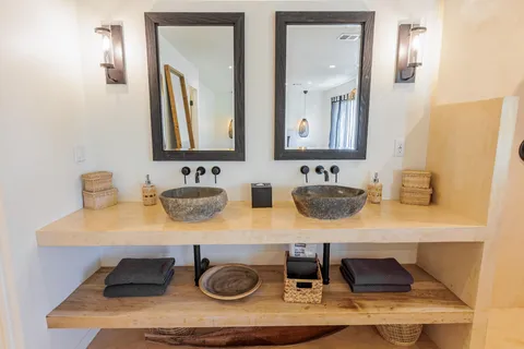 a room with a table and a rug