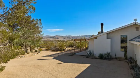 a view of an ocean and a mountain