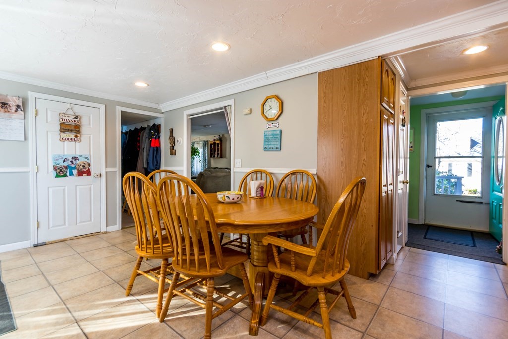 16 Blueberry Road Bourne, MA 02532 - Photo 9 of 22 a view of a dining room with furniture and window
