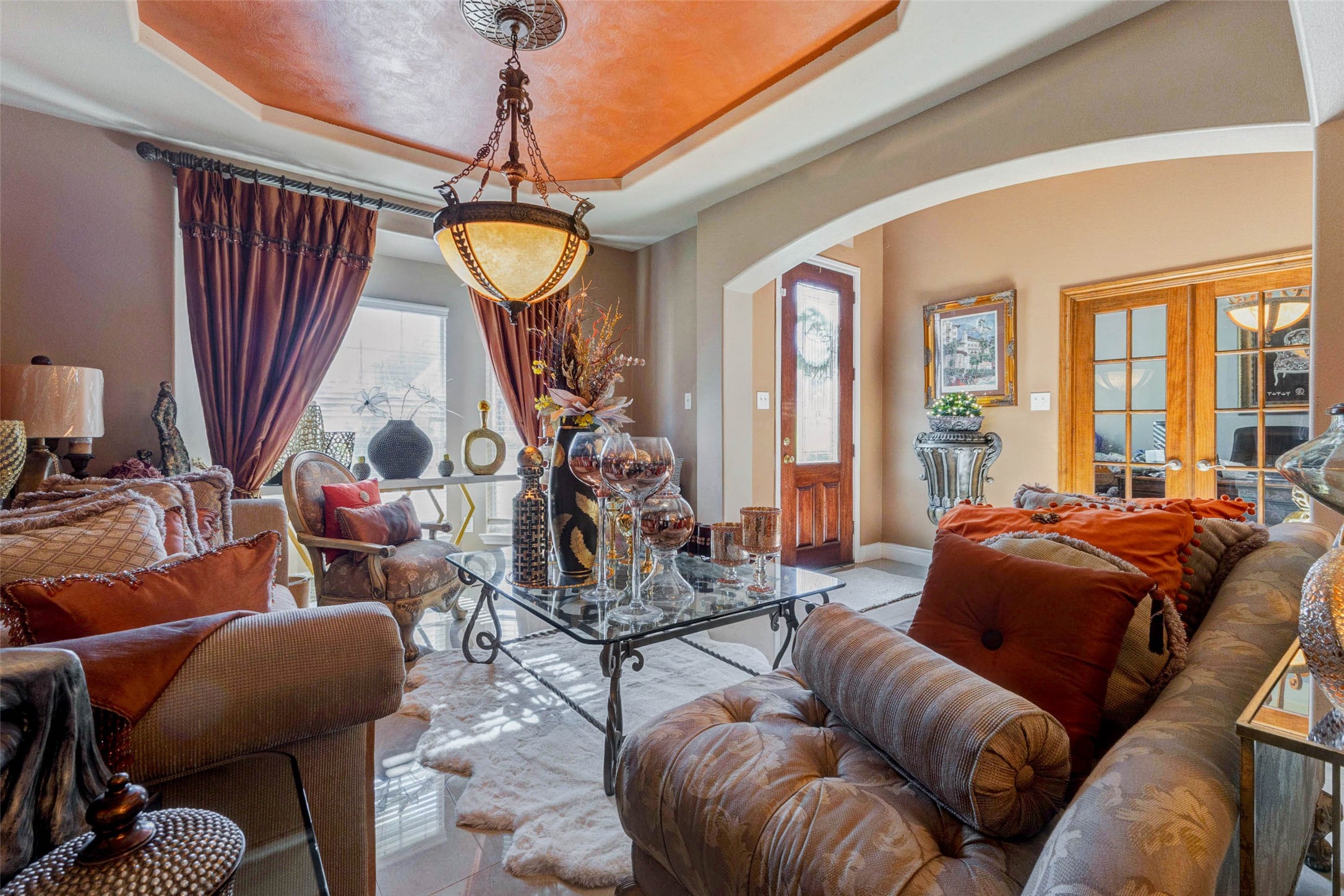 8211 Paddle Rock Lane Rosenberg, TX 77469 - Photo 11 of 50 a living room with furniture a couch and large windows