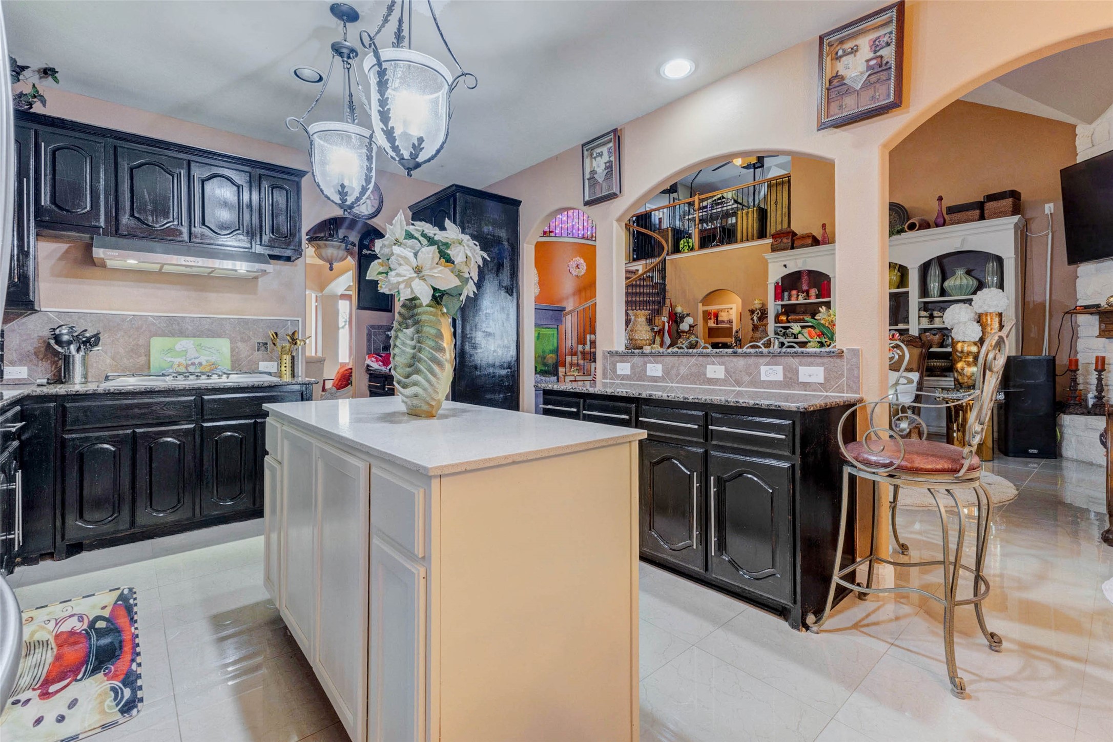 8211 Paddle Rock Lane Rosenberg, TX 77469 - Photo 16 of 50 a kitchen with stainless steel appliances granite countertop a stove and cabinets