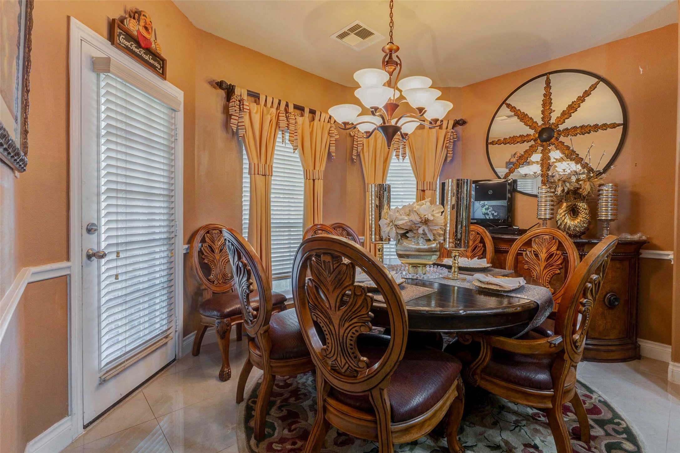 8211 Paddle Rock Lane Rosenberg, TX 77469 - Photo 17 of 50 a view of a dining room with furniture window and wooden floor
