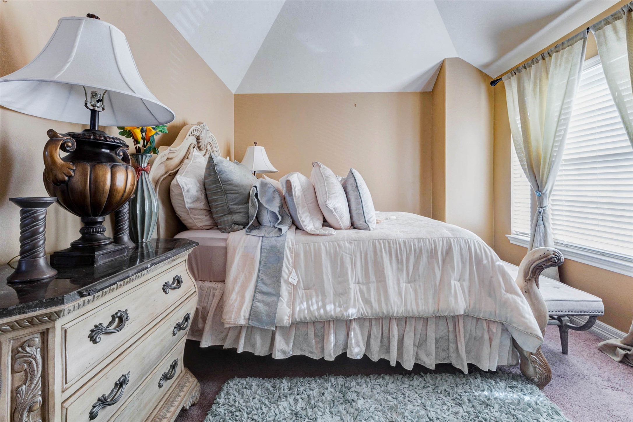 8211 Paddle Rock Lane Rosenberg, TX 77469 - Photo 40 of 50 a bedroom with a bed a lamp and window