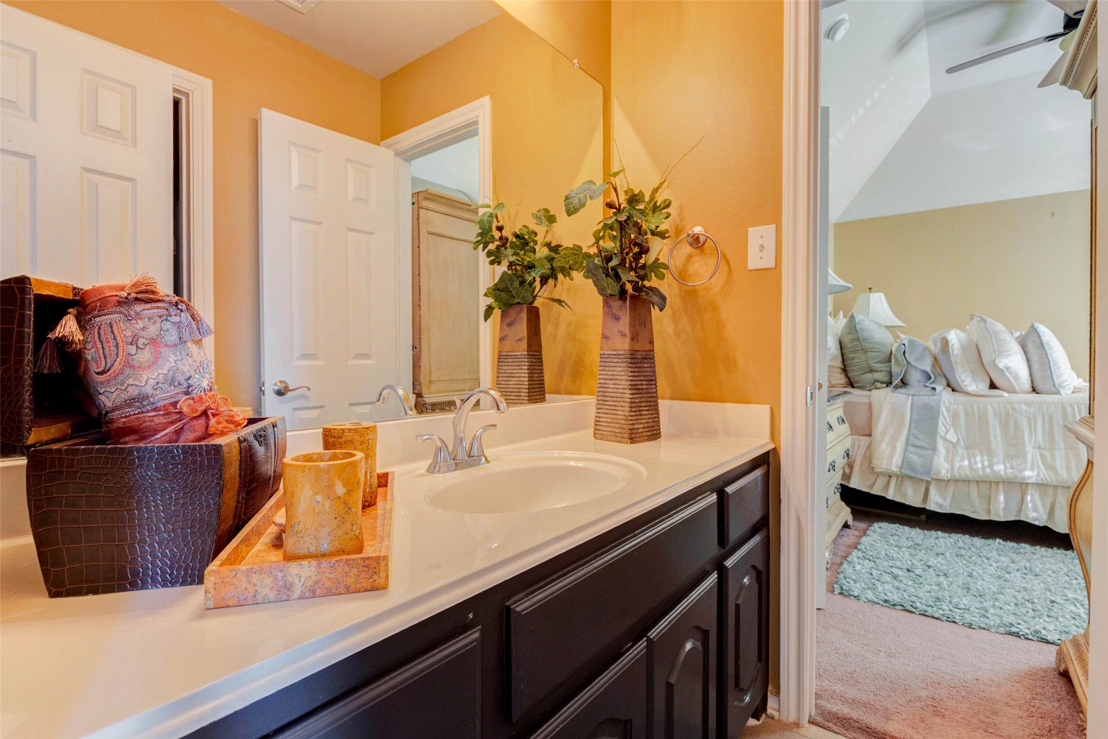 8211 Paddle Rock Lane Rosenberg, TX 77469 - Photo 42 of 50 a living room with furniture and a potted plant