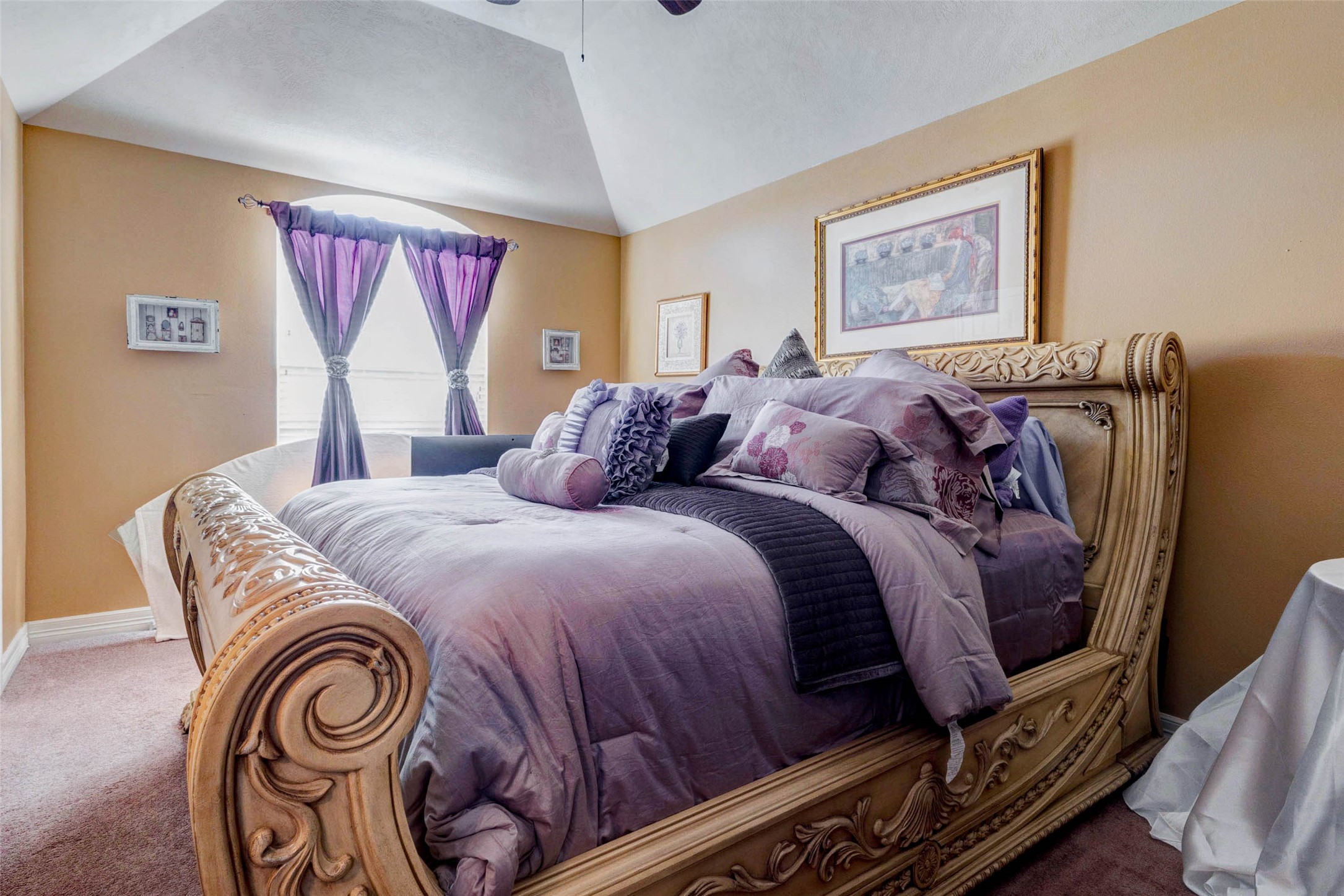 8211 Paddle Rock Lane Rosenberg, TX 77469 - Photo 43 of 50 a bedroom with a bed and a painting on the wall