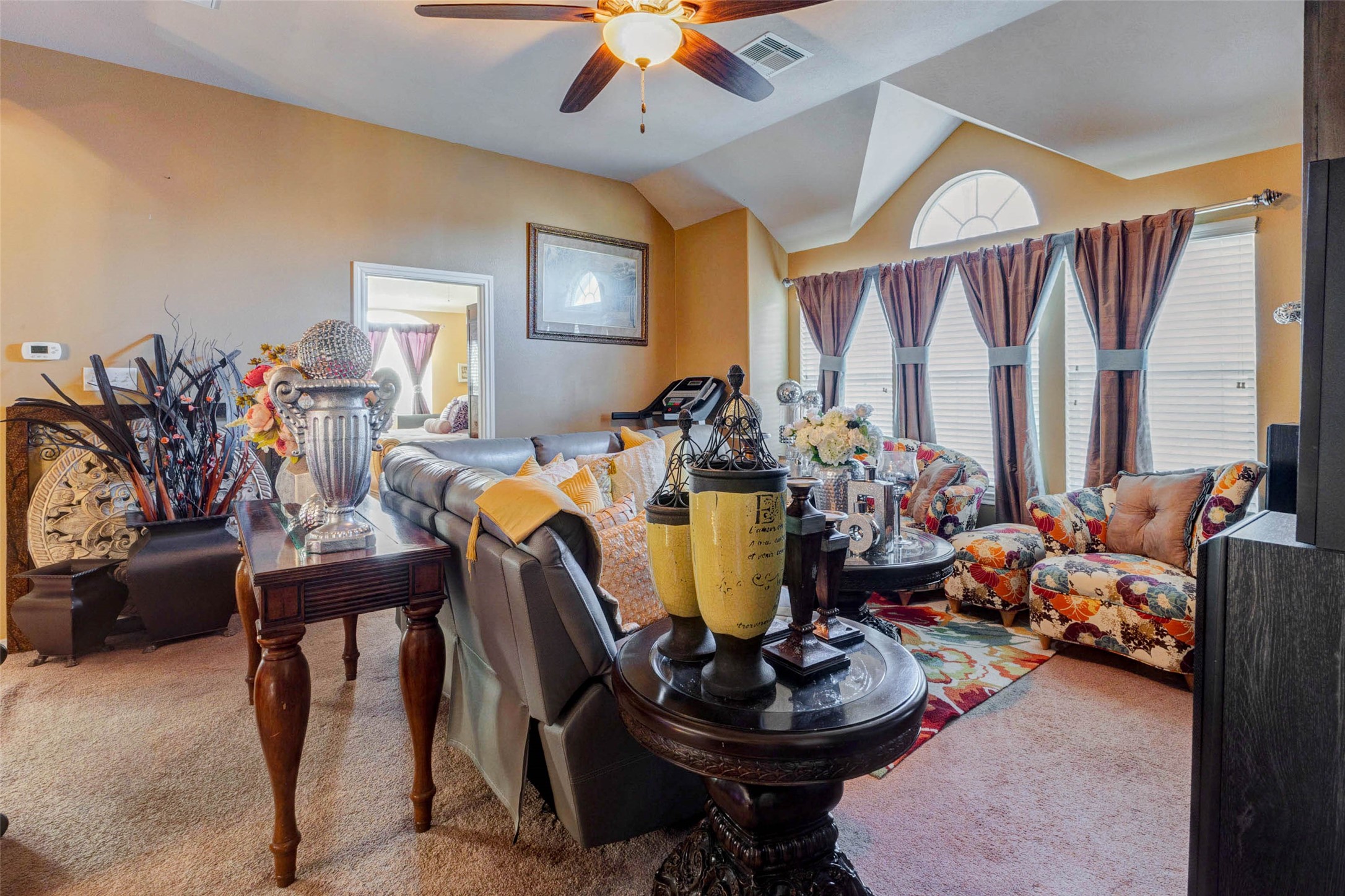 8211 Paddle Rock Lane Rosenberg, TX 77469 - Photo 44 of 50 a room with furniture and a window