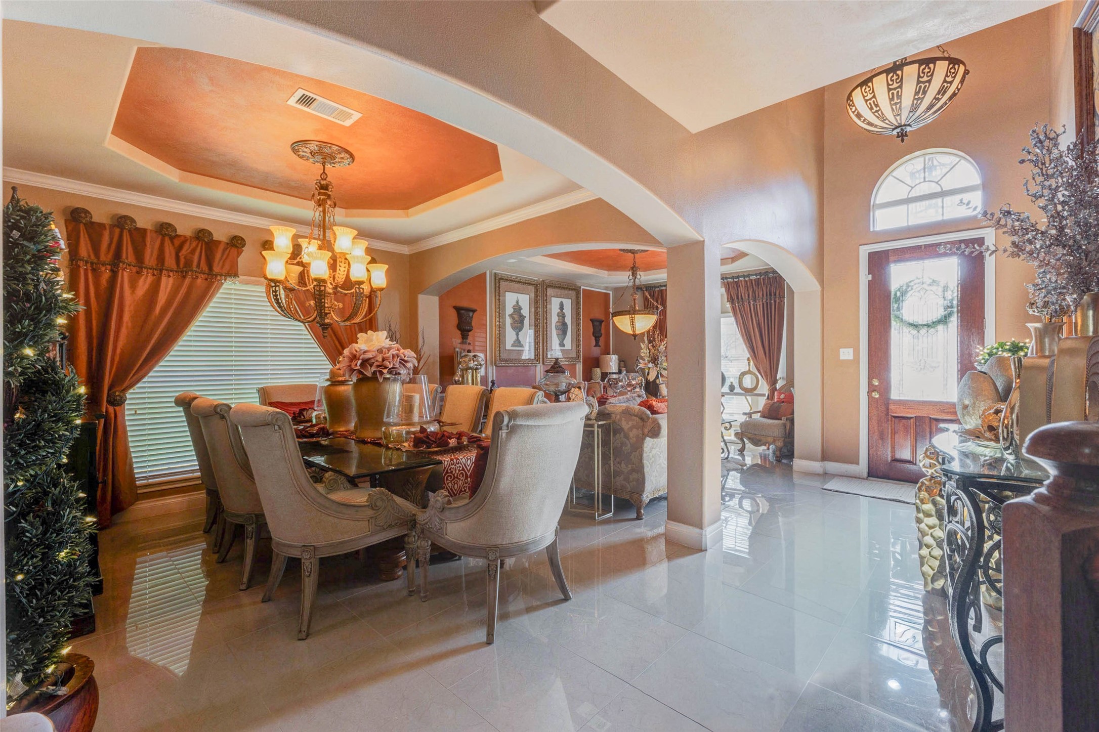 8211 Paddle Rock Lane Rosenberg, TX 77469 - Photo 7 of 50 a view of a dining room with furniture and wooden floor