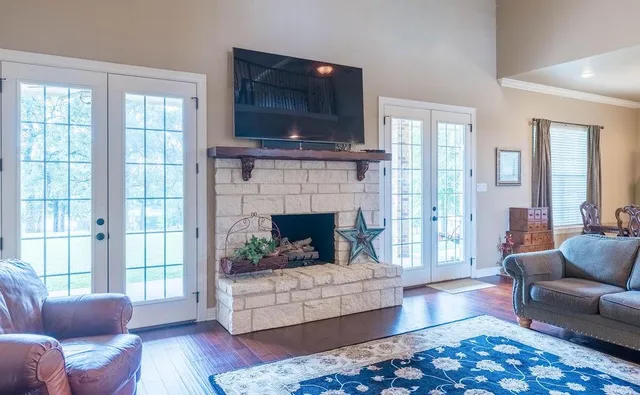 a living room with furniture or couch and a dining table