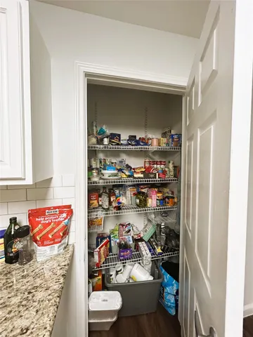 a room with storage and utility