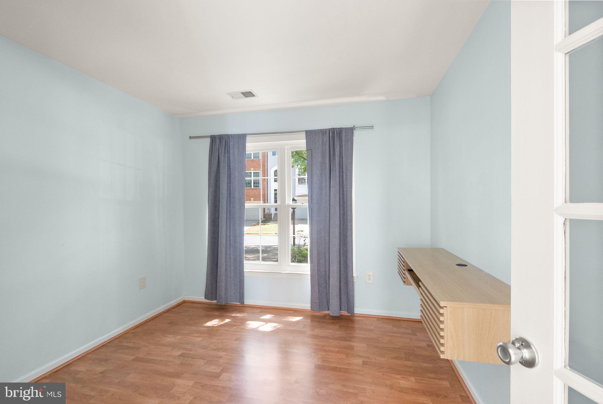21659 Frame Square Broadlands, VA 20148 - Photo 14 of 68 a view of an empty room with glass door