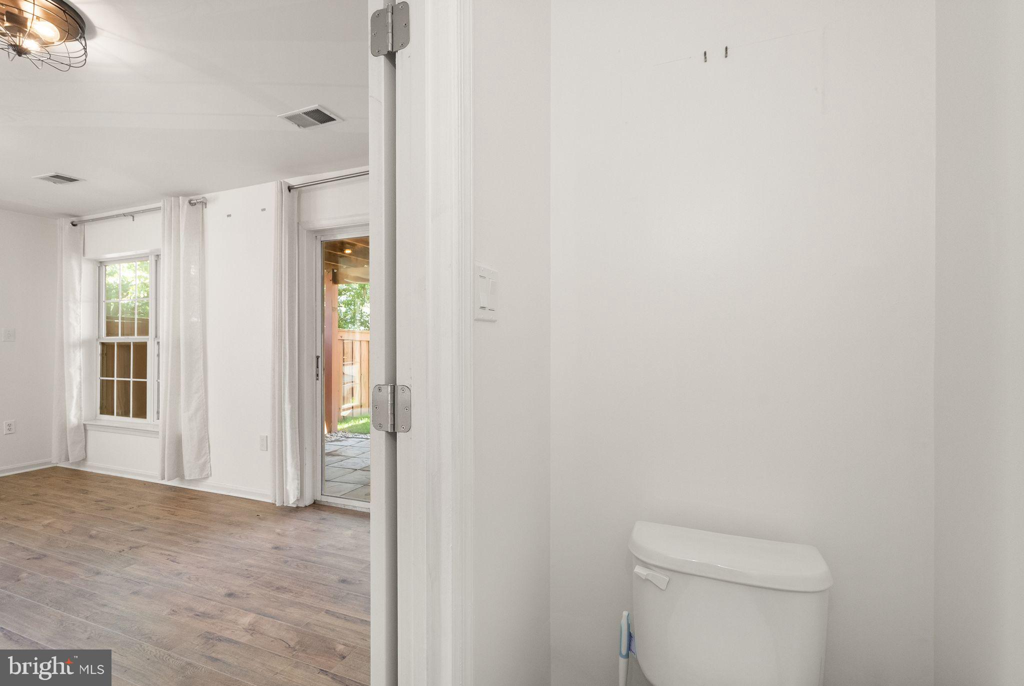 21659 Frame Square Broadlands, VA 20148 - Photo 19 of 68 a bathroom with a toilet and a shower