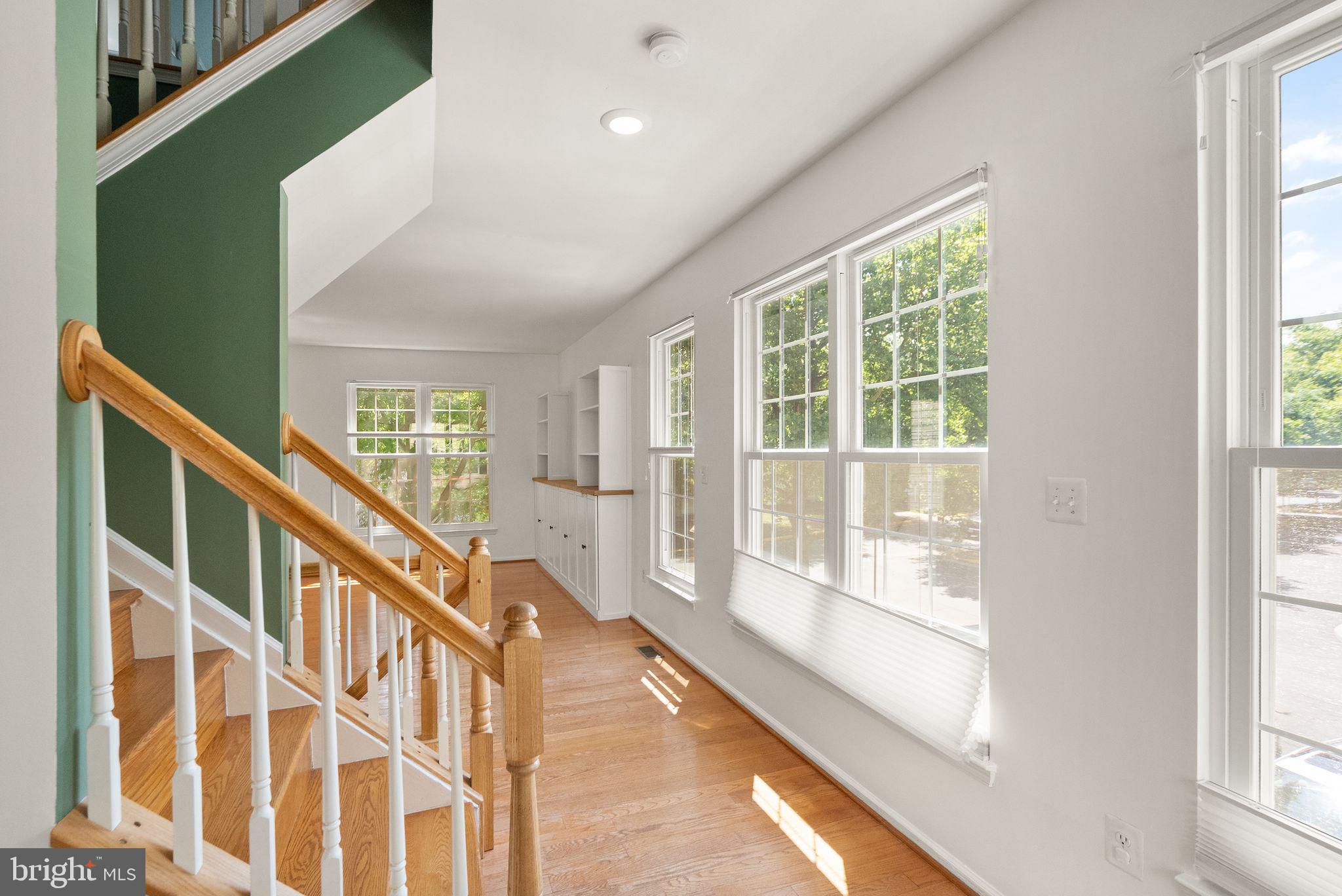 21659 Frame Square Broadlands, VA 20148 - Photo 21 of 68 a view of an entryway with wooden floor