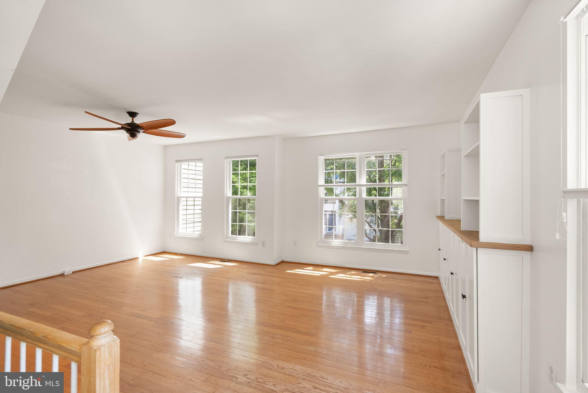 21659 Frame Square Broadlands, VA 20148 - Photo 28 of 68 a view of an empty room with wooden floor and a window