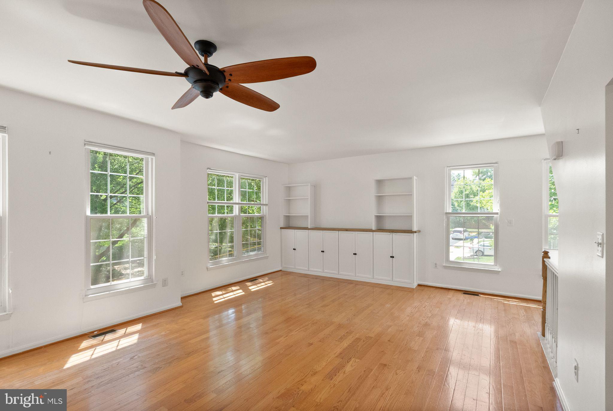 21659 Frame Square Broadlands, VA 20148 - Photo 31 of 68 a view of empty room with wooden floor and fan
