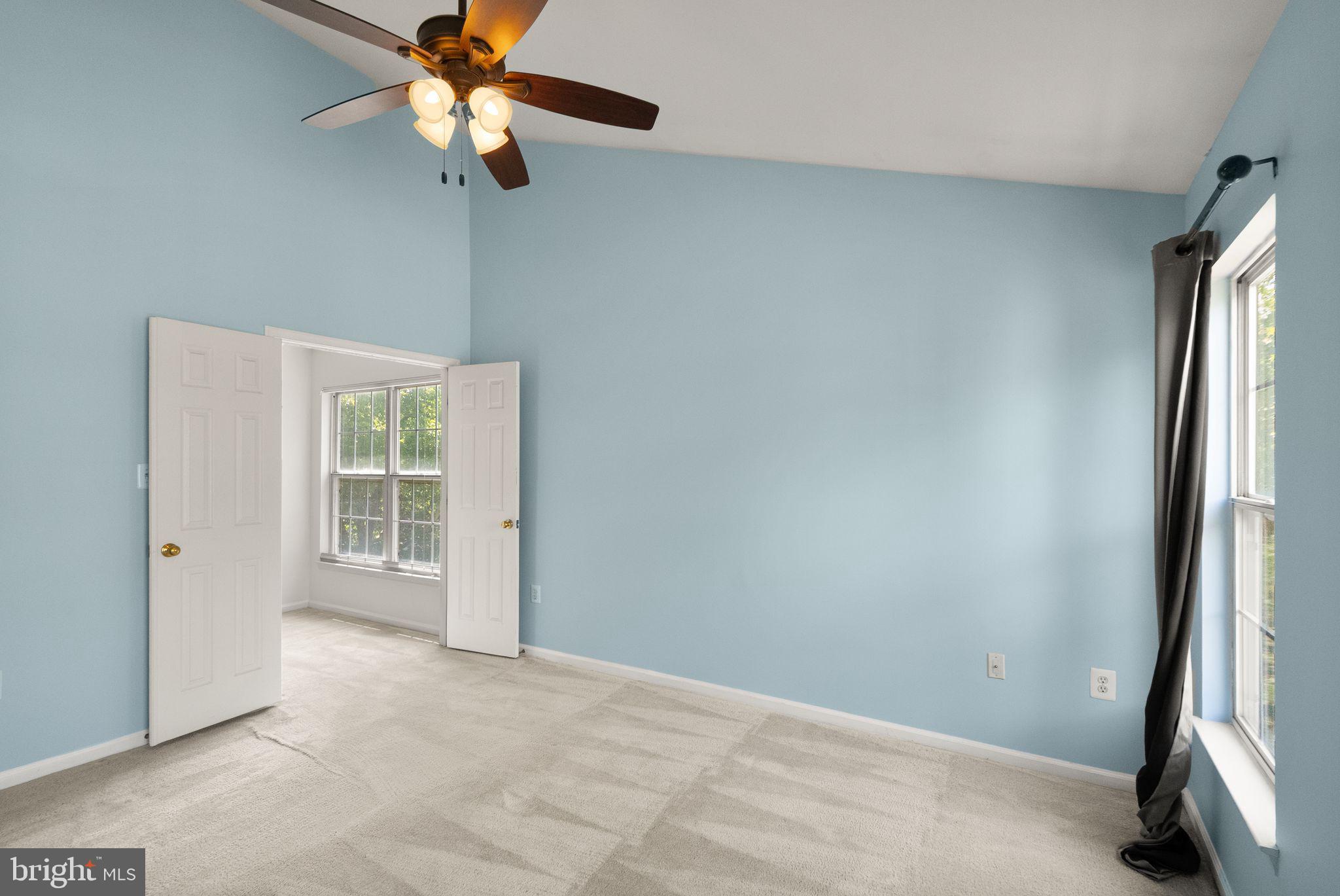 21659 Frame Square Broadlands, VA 20148 - Photo 40 of 68 an empty room with windows and fan