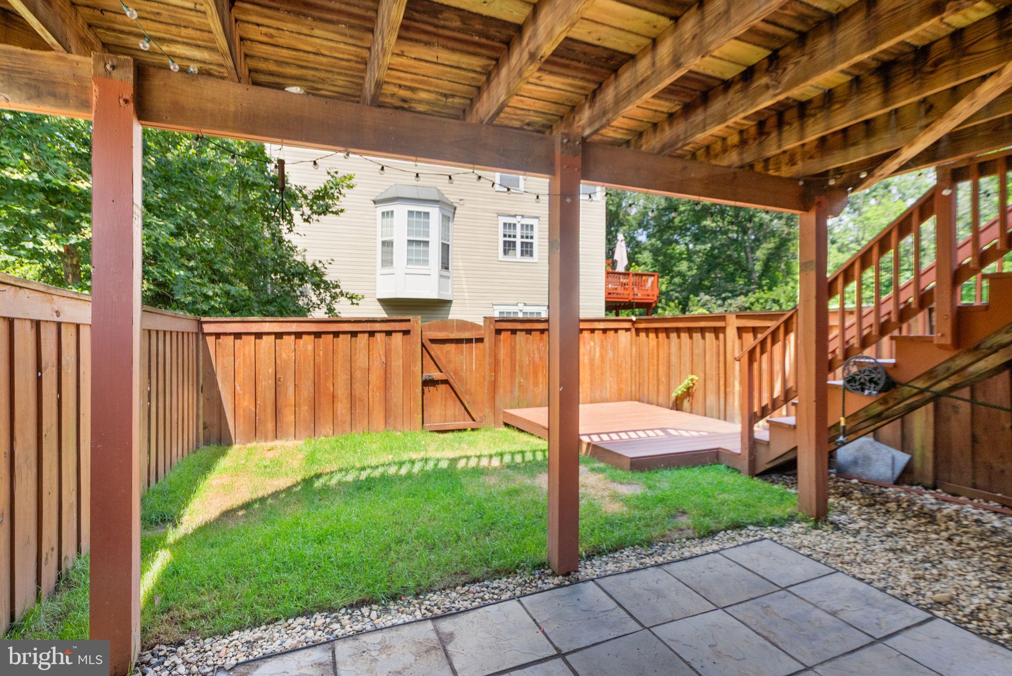 21659 Frame Square Broadlands, VA 20148 - Photo 56 of 68 a view of a backyard with a garden