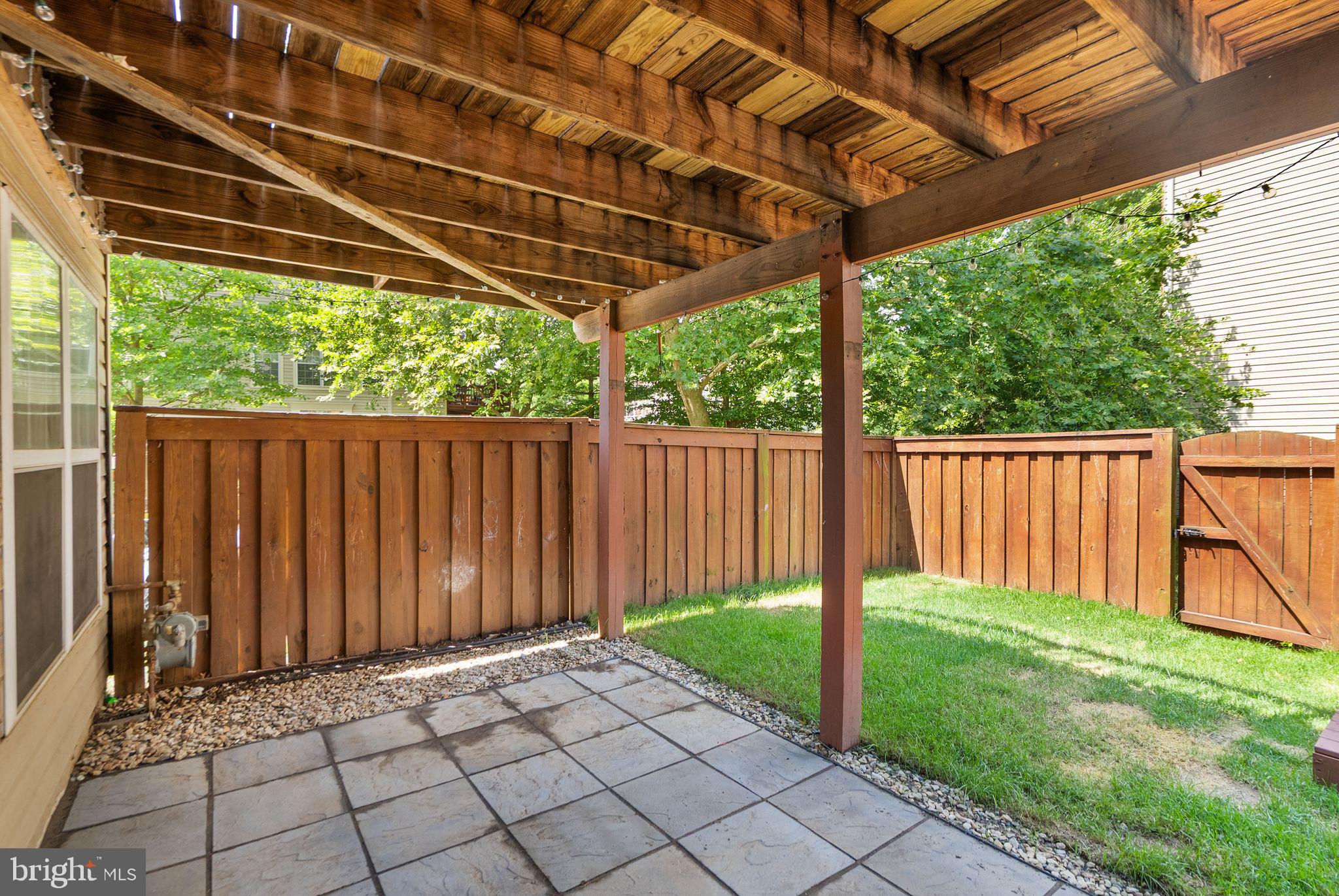 21659 Frame Square Broadlands, VA 20148 - Photo 57 of 68 a view of a backyard with wooden fence