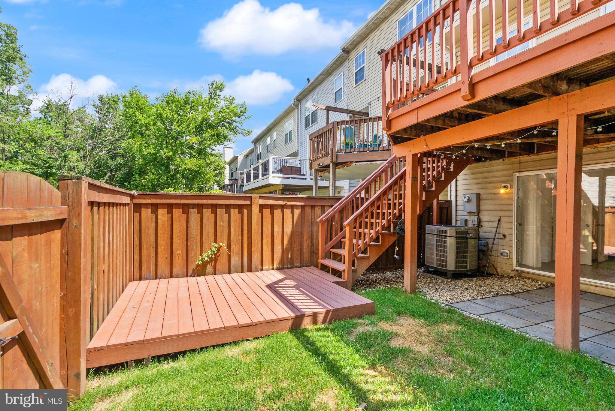 21659 Frame Square Broadlands, VA 20148 - Photo 61 of 68 a view of backyard with deck and a garden
