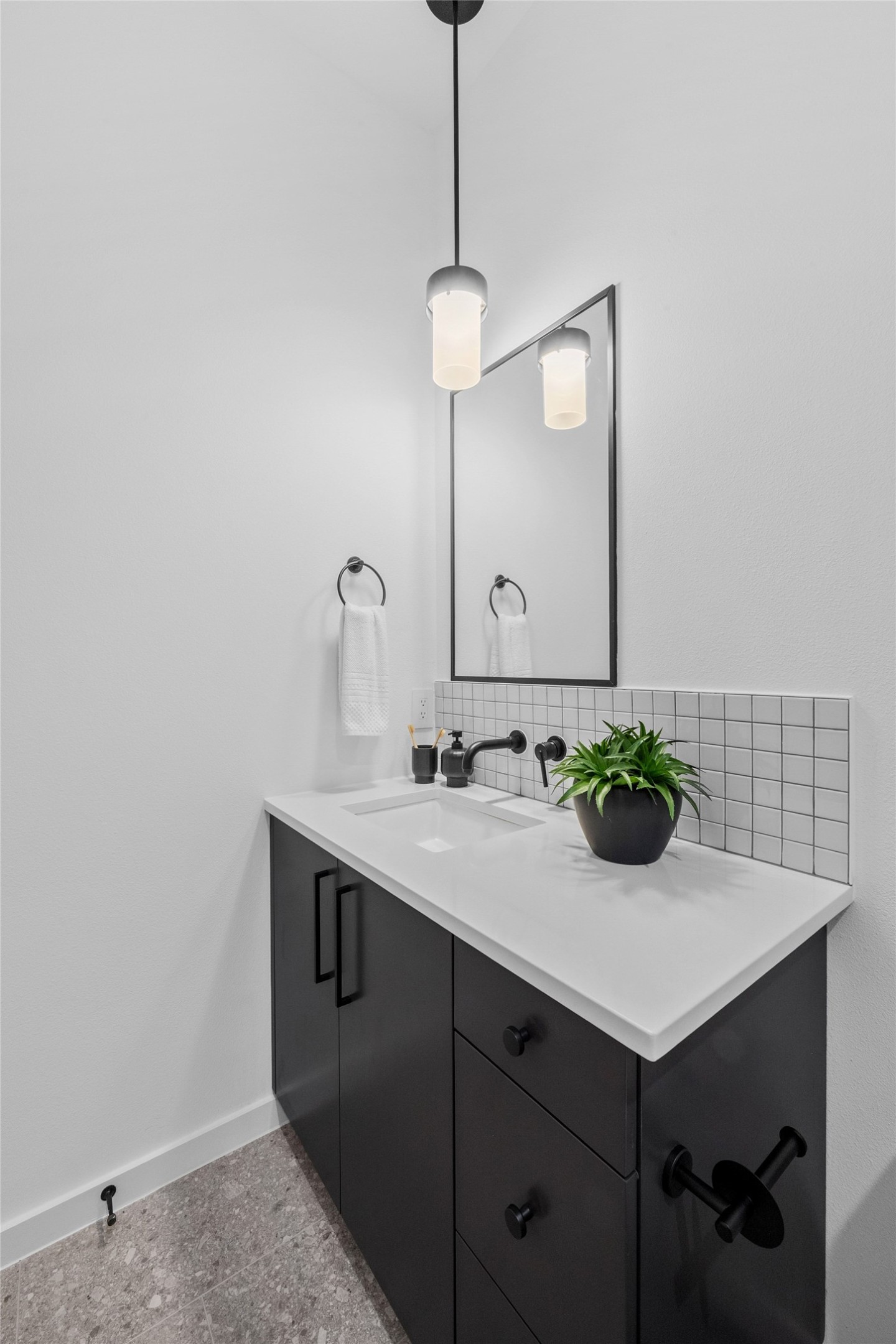 219 Lessin Lane, Unit 10A Austin, TX 78704 - Photo 14 of 28 a bathroom with a sink and a mirror