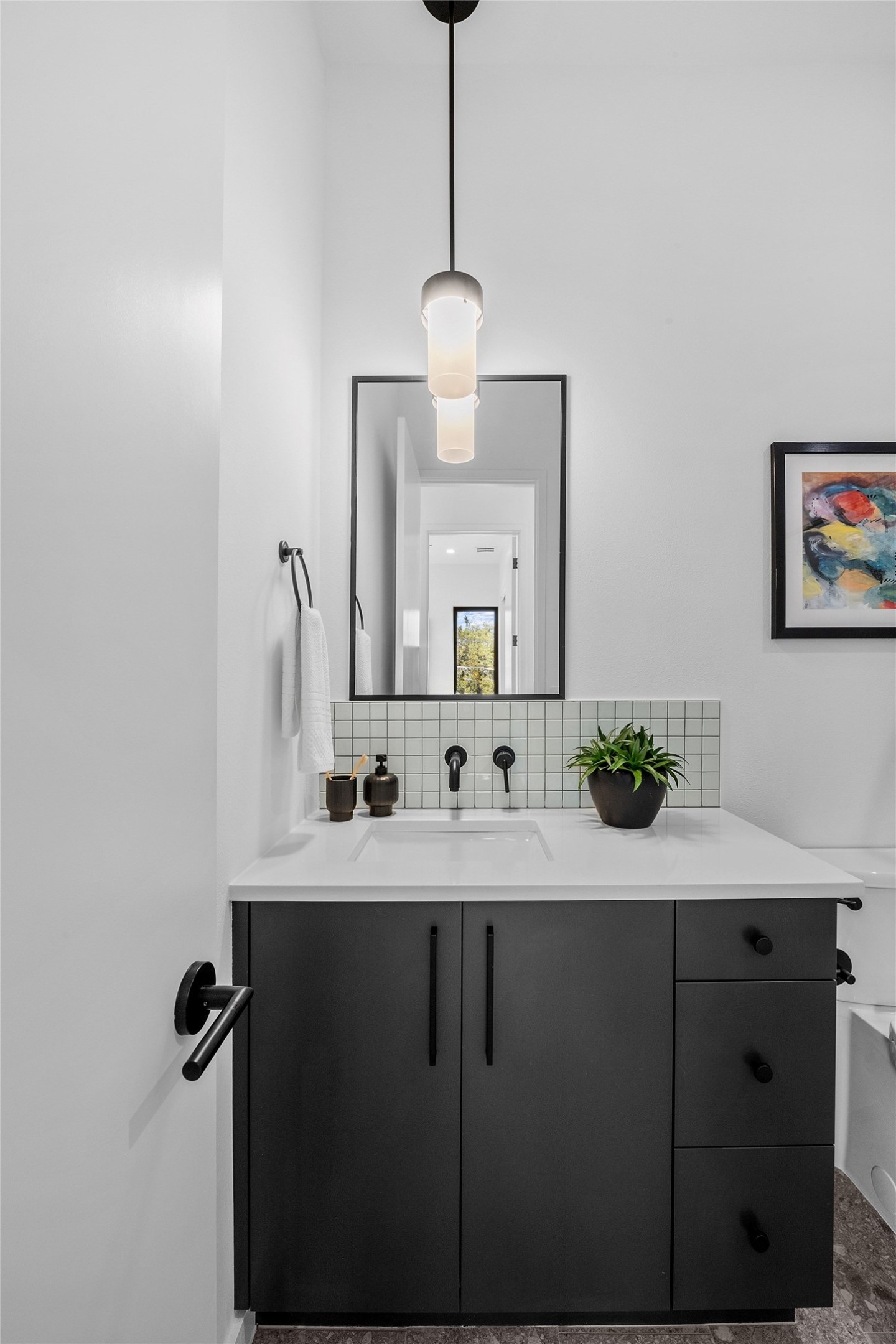 219 Lessin Lane, Unit 10A Austin, TX 78704 - Photo 15 of 28 a bathroom with a sink and a mirror