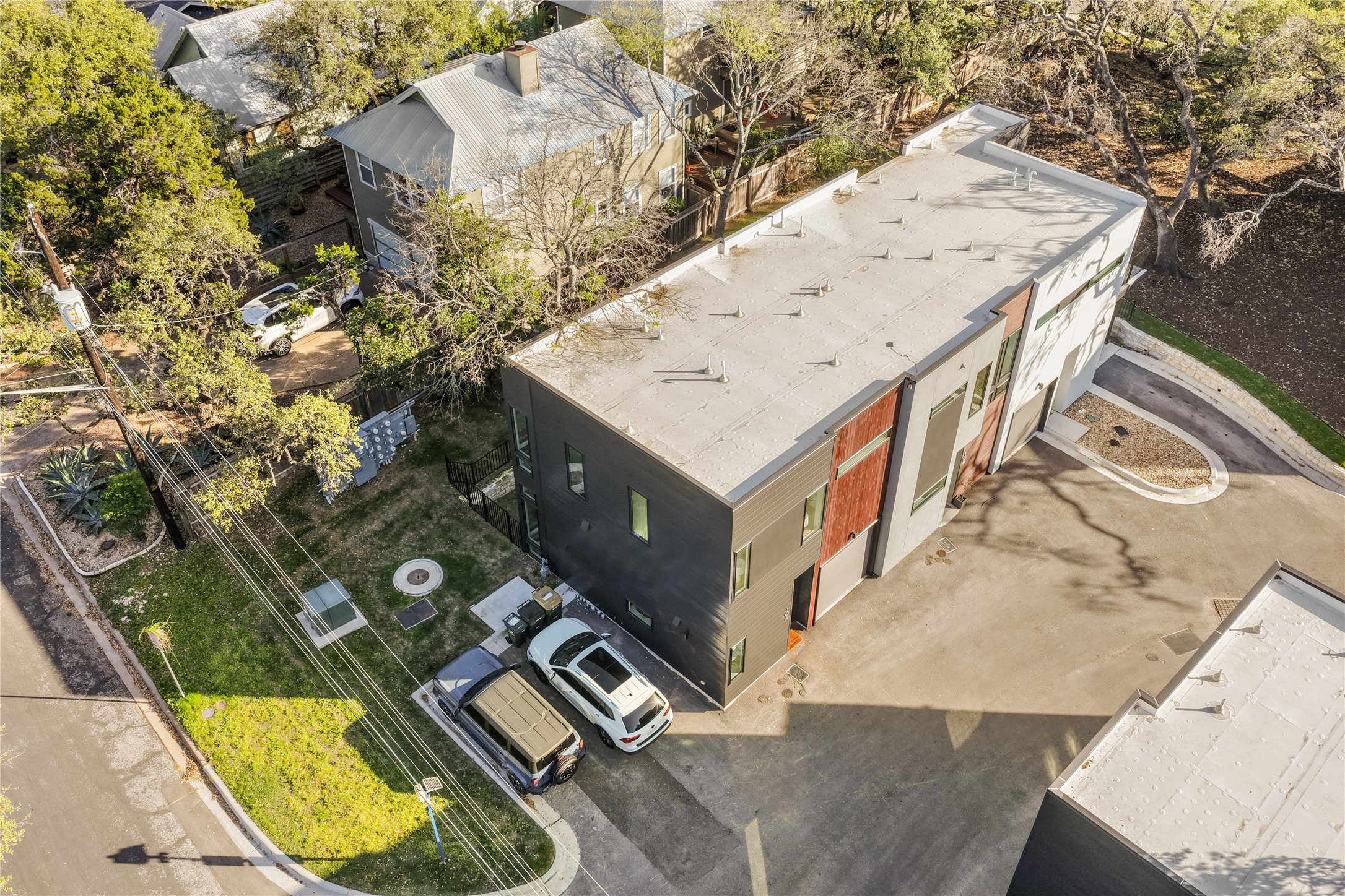 219 Lessin Lane, Unit 10A Austin, TX 78704 - Photo 26 of 28 an aerial view of a house with swimming pool
