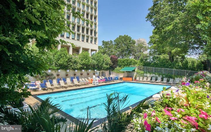 220 Locust Street, Unit 26AS Philadelphia, PA 19106 - Photo 3 of 9 a view of swimming pool with a garden and plants