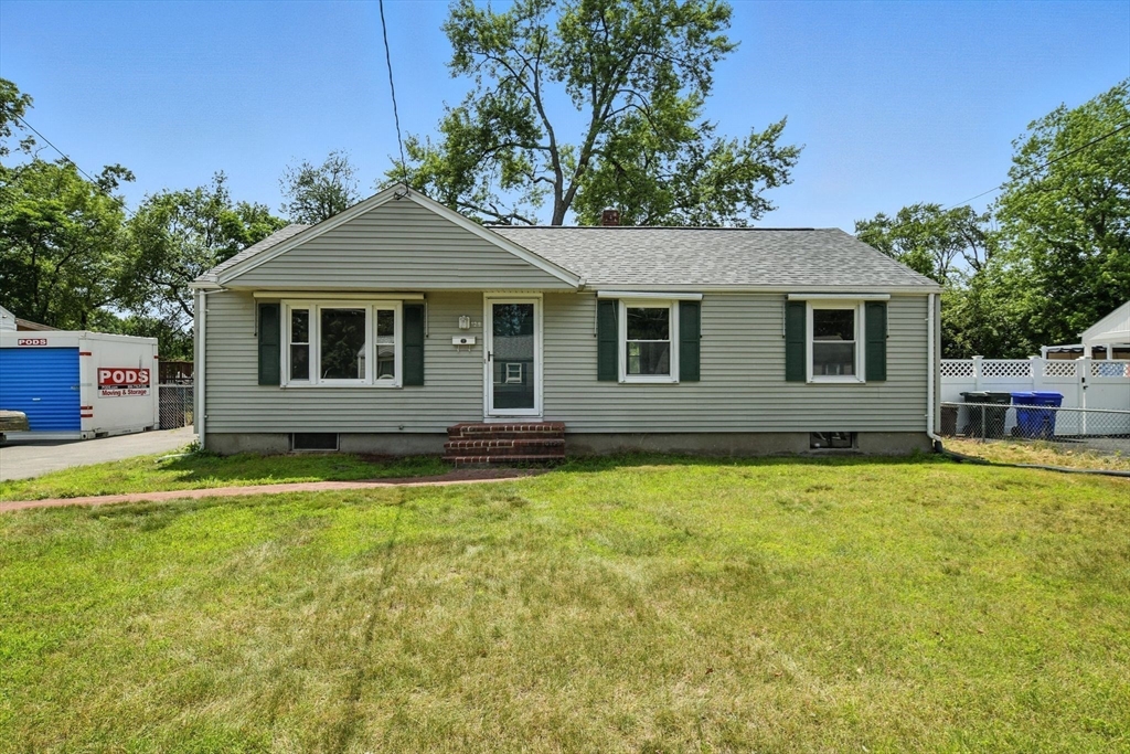 128 Drexel Street Springfield, MA 01104 - Photo 1 of 38 a front view of a house with a yard