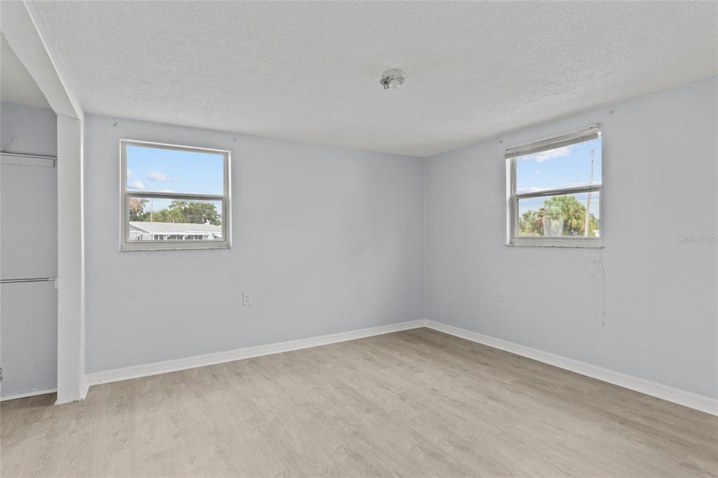 1623 Plum Tree Road Holiday, FL 34690 - Photo 14 of 33 an empty room with a window