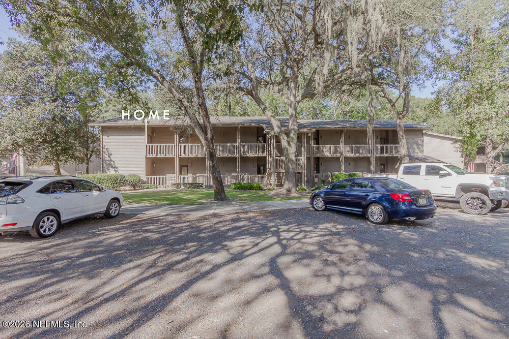 a car parked in front of a house