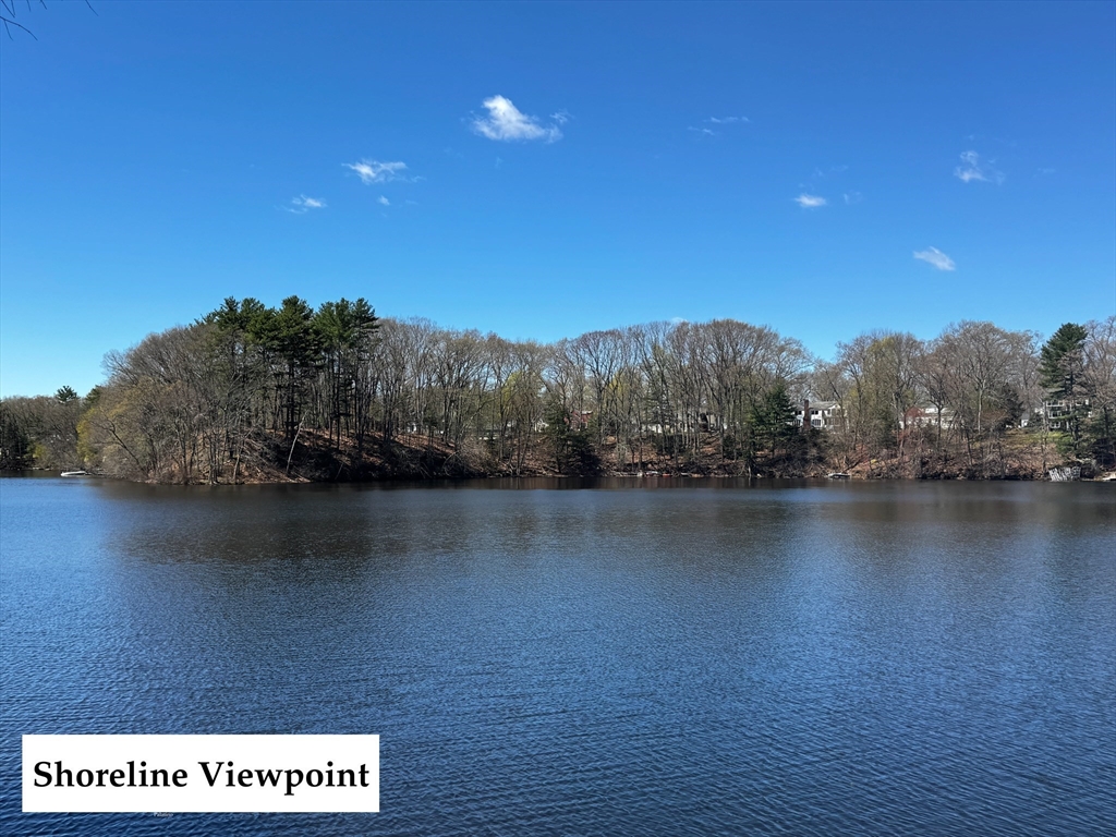 31 Arcadia Road Natick, MA 01760 - Photo 6 of 20 a view of a lake with houses