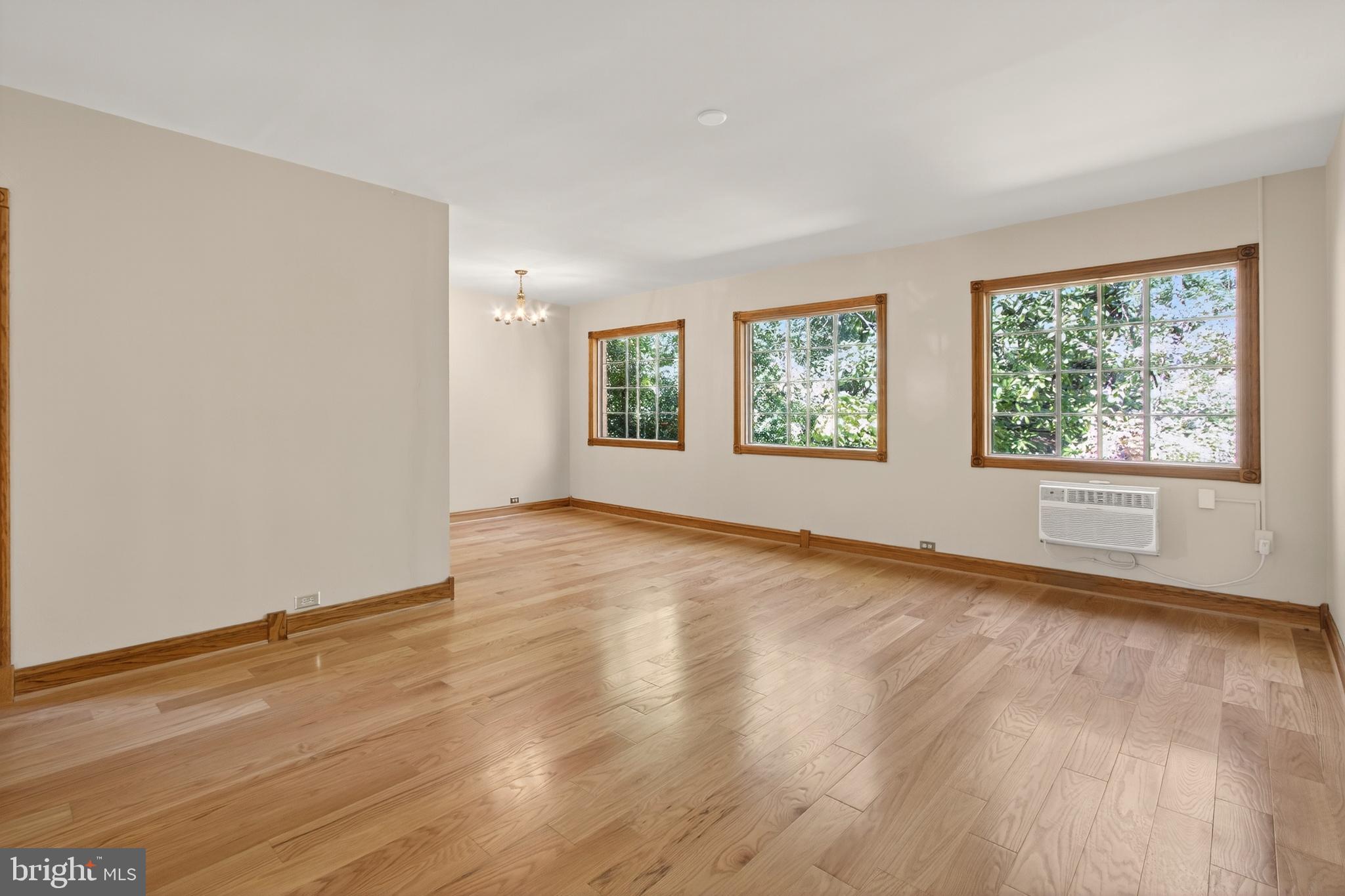 1649 Preston Road Alexandria, VA 22302 - Photo 6 of 31 an empty room with wooden floor and windows