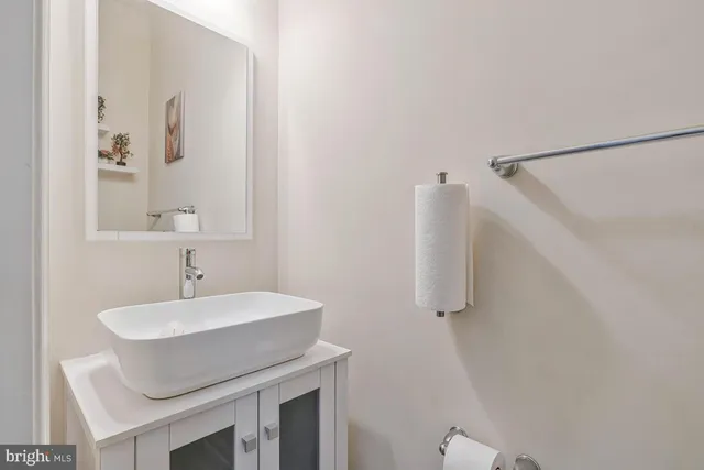 a balcony with furniture and wooden floor