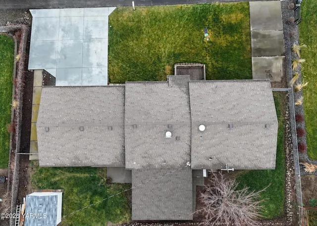 a terrace door with tall trees