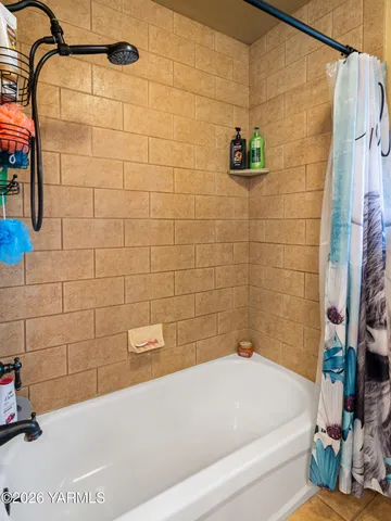 a bathroom with a bathtub