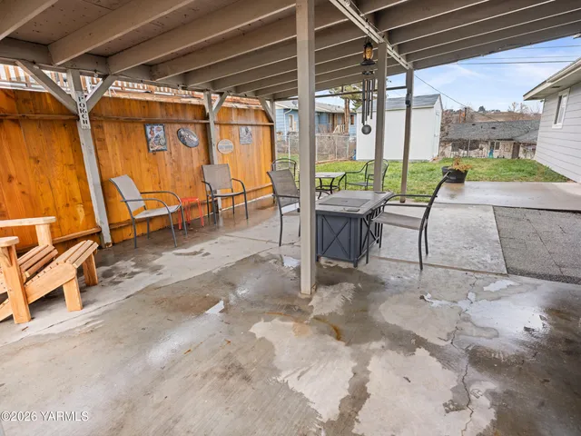 a view of chairs and tables in patio