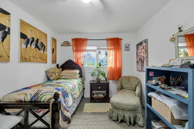 a bedroom with a bed and a closet