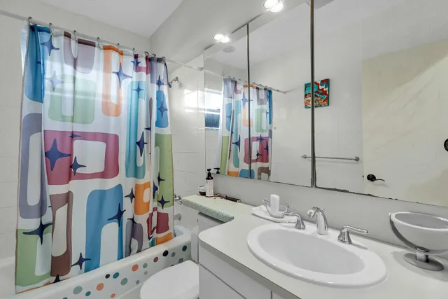 a view of two chairs in the balcony