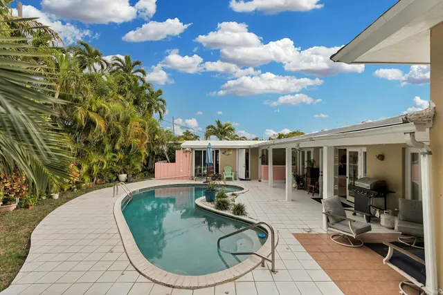 a bed room with a bed and a book shelf