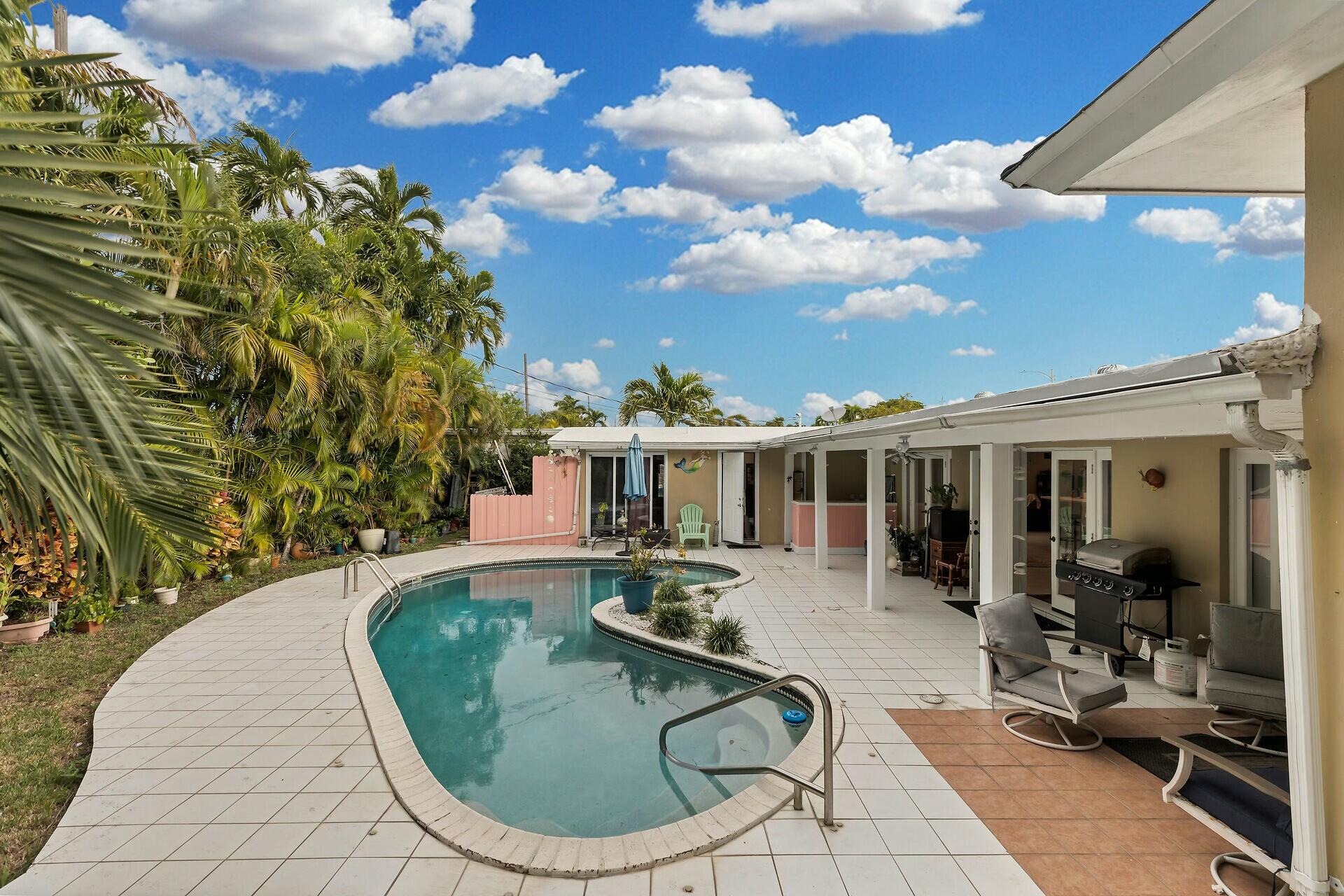 1106 17th Street Key West, FL 33040 - Photo 28 of 33 a view of a swimming pool with sitting area