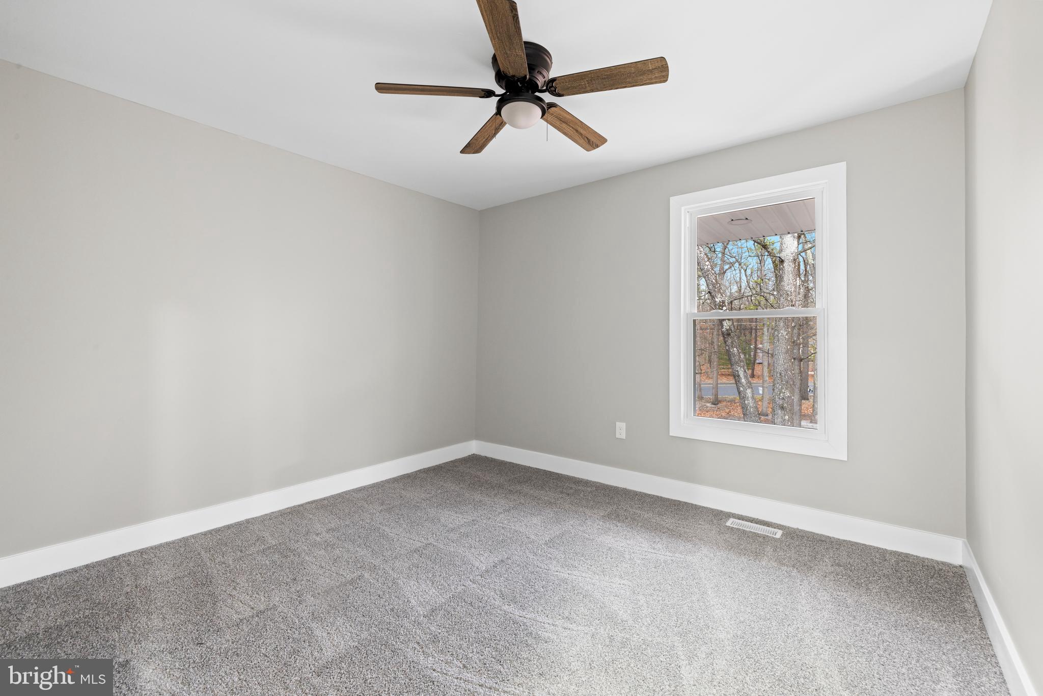 147 Sooy Place Road Tabernacle, NJ 08088 - Photo 14 of 27 a view of an empty room with a window