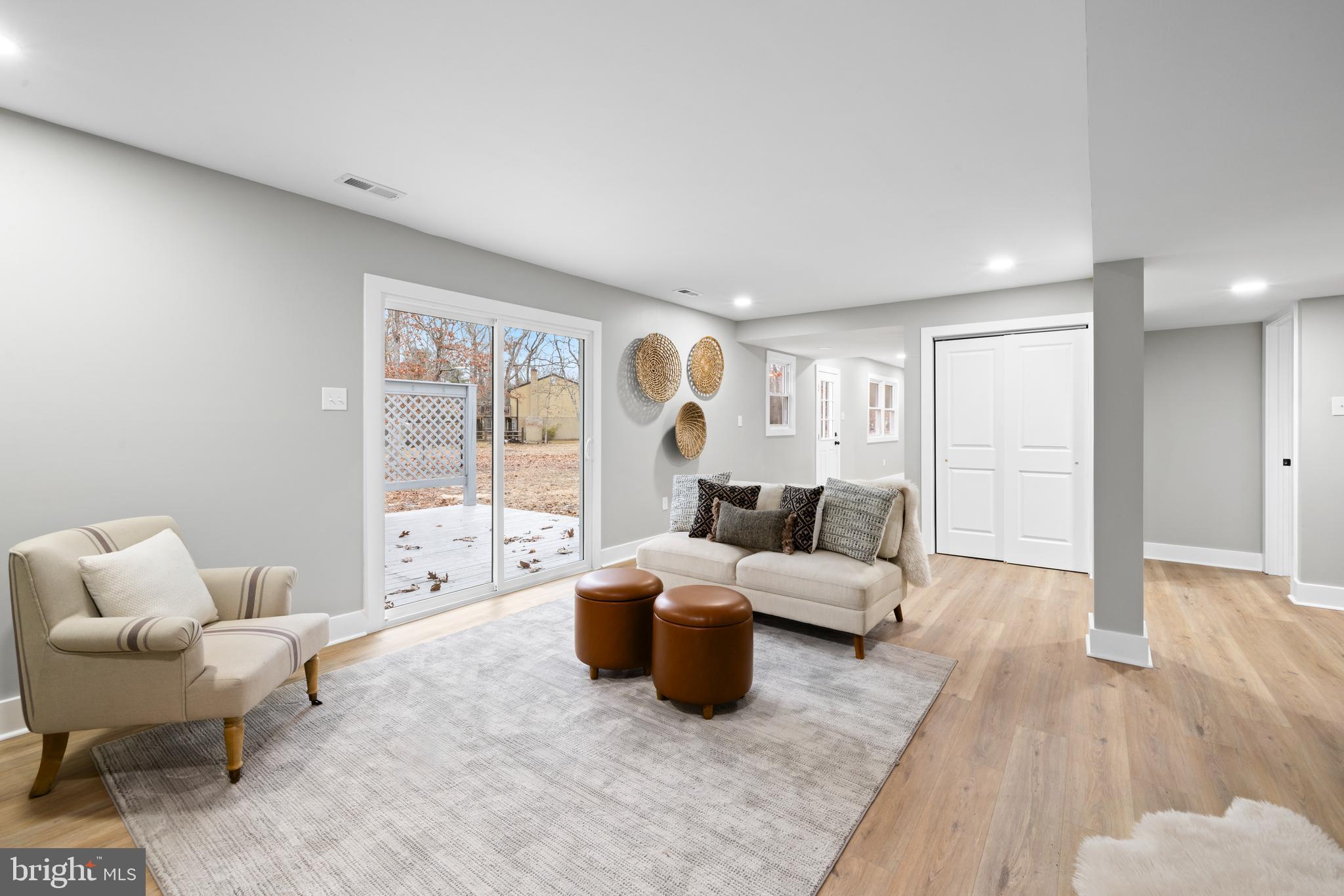 147 Sooy Place Road Tabernacle, NJ 08088 - Photo 16 of 27 a living room with furniture and a large window