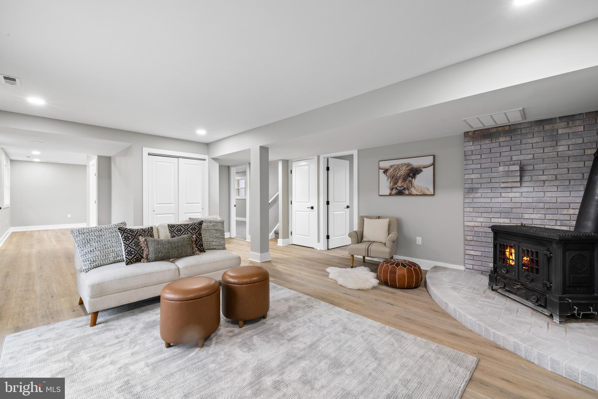 147 Sooy Place Road Tabernacle, NJ 08088 - Photo 17 of 27 a living room with furniture and a fireplace